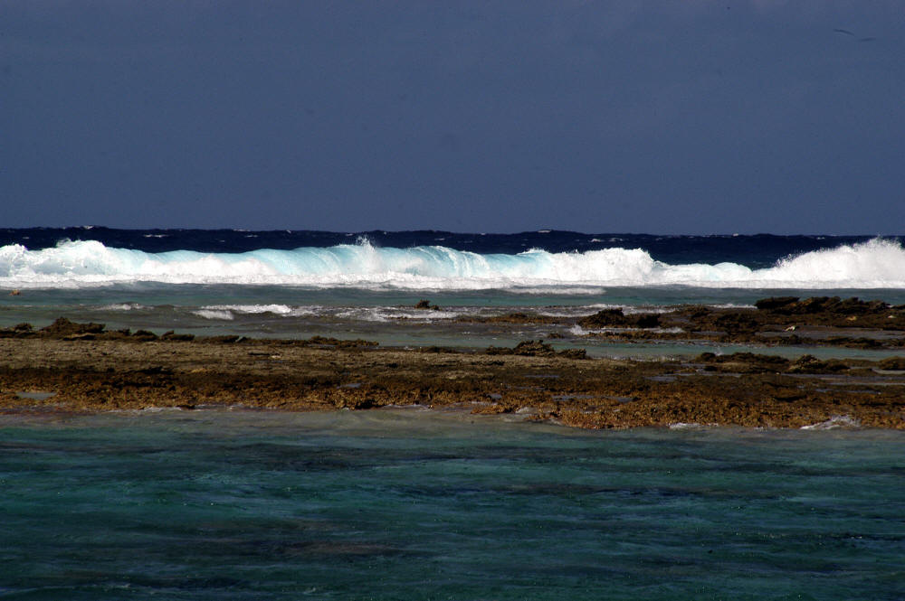 ocean waves crashing. The ocean waves crashing